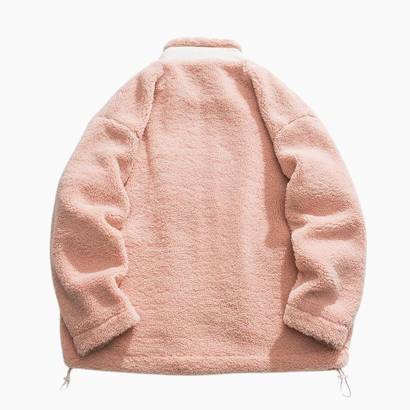 Manteau de couleur rose en matière Pilou Pilou pour femme.