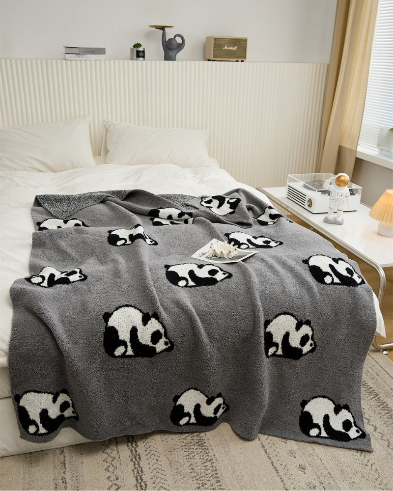 Plaid en matière polaire de couleur gris foncé avec motifs de pandas