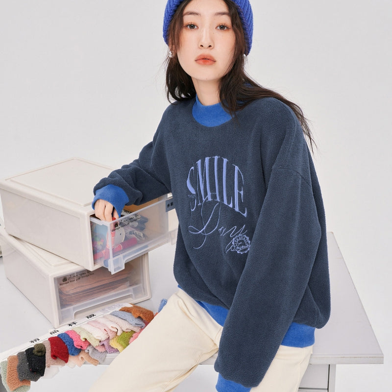 Pull en matière Pilou Pilou de couleur bleu marine