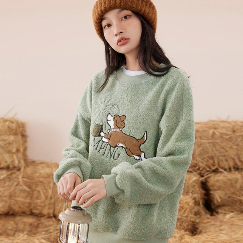 Pull en matière Pilou Pilou de couleur vert avec motif amusant